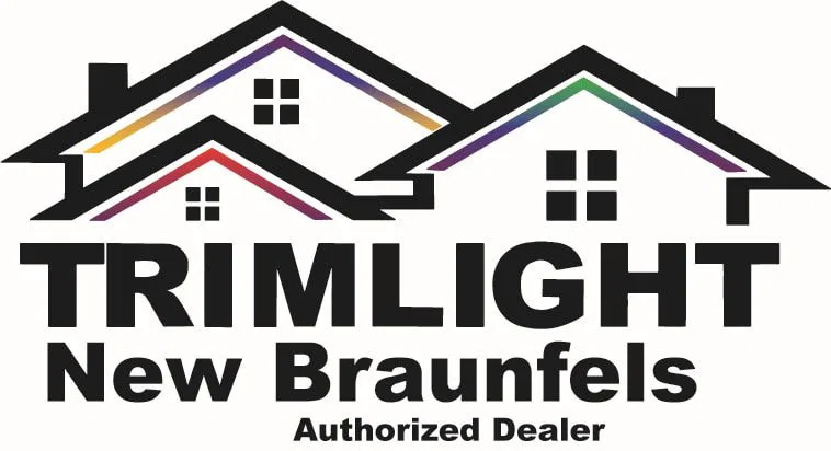 Logo with three overlapping house outlines featuring colorful roof lines. Below the houses is bold text: TRIMLIGHT New Braunfels. Smaller text underneath reads: Authorized Dealer.