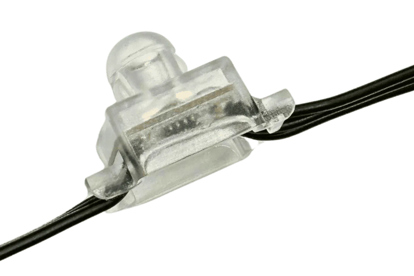 Close-up of a transparent plastic wire connector joining two black electrical wires, isolated on a white background.