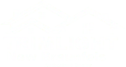 Logo featuring two overlapping house outlines with windows, above the text Trimlight New Braunfels Authorized Dealer in bold white letters on a light background.